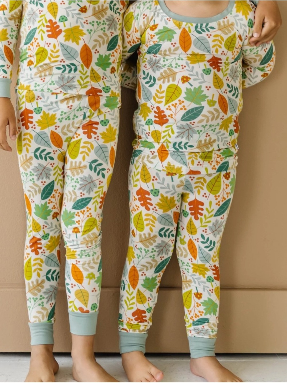 Little Sleepies Cream Pajama Set with Green, Orange & Yellow Leaf Print